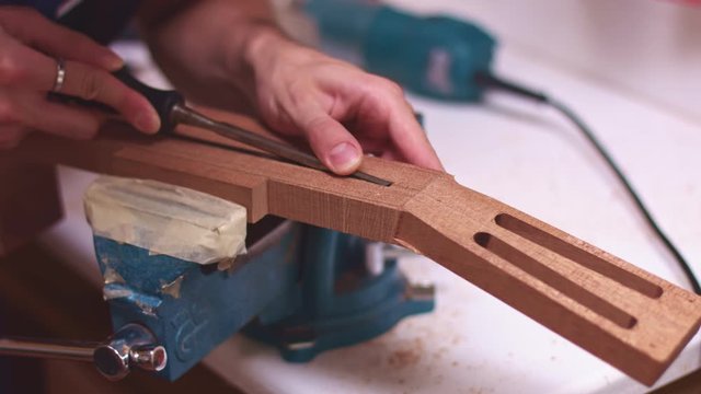 Guitar maker widen guitar neck truss rod 