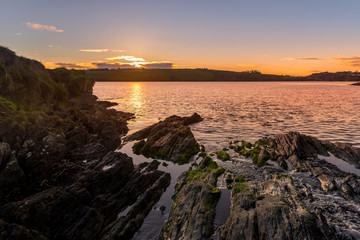 Fototapeta premium Beautiful view sunset rocks bay Atlantic Way Charles Fort Kinsale Cork Ireland