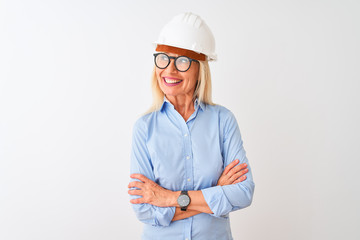 Middle age architect woman wearing glasses and helmet over isolated white background smiling looking to the side and staring away thinking.