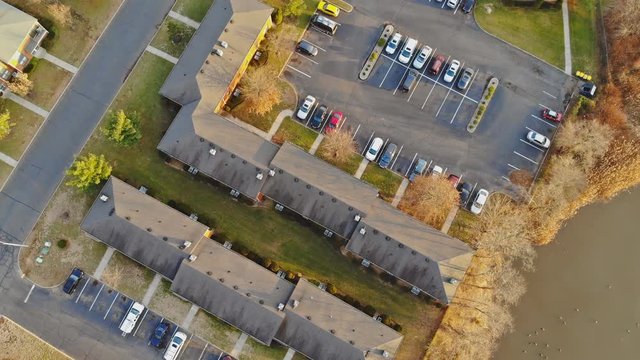 Top view of the sleeping area with a car parking flying at an altitude