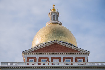 Fototapeta na wymiar Gleaming gold dome on historic building