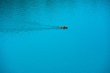 Relaxing rinde with a Boat on water