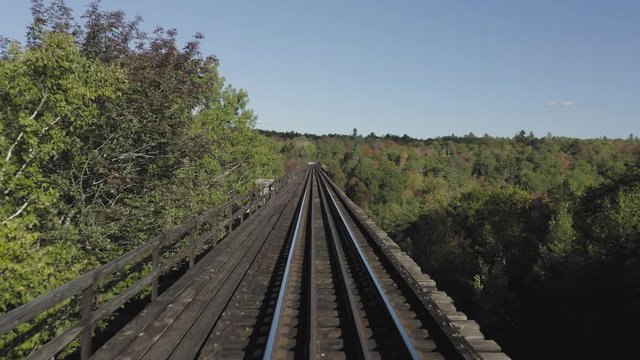 POV Train track view over Onawa Trestle Bridge 4K
