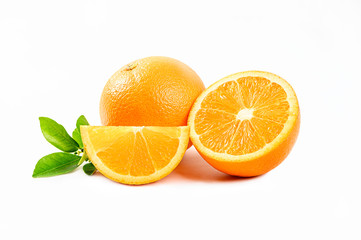 Fresh Orange with half and leaves isolated on white background