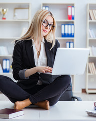 Businesswoman frustrated meditating in the office