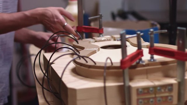 Guitar maker sping clamp a guitar body