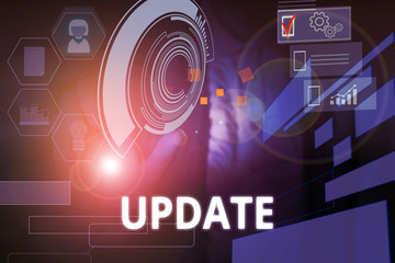 Writing note showing UPDATE. Business concept for make something more modern or up to date like software program Woman wear formal work suit presenting presentation using smart device