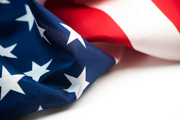 Closeup of American flag on plain background