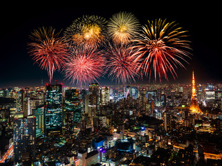 Fireworks over Tokyo cityscape at night, Japan