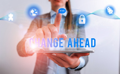 Conceptual hand writing showing Change Ahead. Concept meaning to replace with or exchange for another Become different Female human wear formal work suit presenting smart device