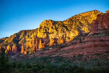 Sedona Red Rocks at Sunset under a blue sky