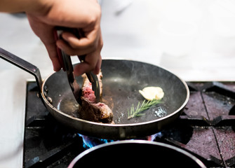 Chef cooking food in the kitchen, Chef preparing food