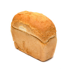 Loaf of white rectangular wheat bread on a white background