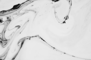 Abstract painting technique Ebru .Turkish style Ebru on the water with acrylic paints press waves.Modern art marble liquid texture