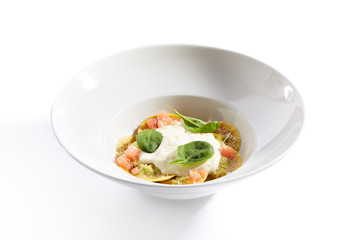 Ravioli with spinach, concasse and cheese espuma closeup