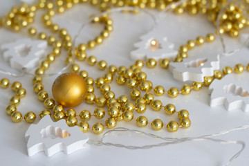 Christmas ball, Christmas garland and beads close-up
