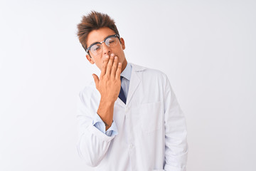 Young handsome sciencist man wearing glasses and coat over isolated white background bored yawning tired covering mouth with hand. Restless and sleepiness.