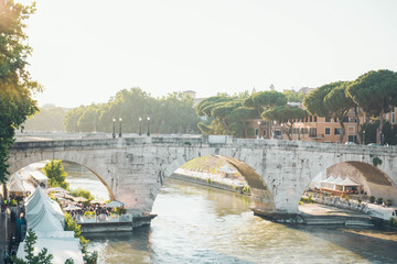 A bridge over the tiber river in Rome, Italy.