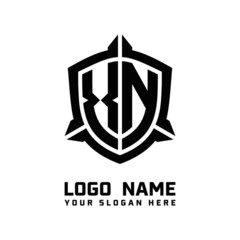 Obraz premium initial XN letter with shield style logo template vector. shield shape black monogram logo