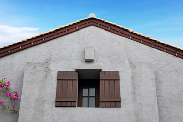 Building modern house construction with tile roof, Decorated with light bulbs, Blur sky background. Clipping path.