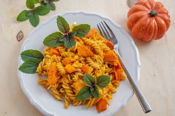Pumpkin pasta with thyme, cream sauce and parmesan
