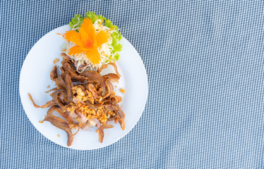 Fried Fish with Garlic and Pepper on white dish,select focus.