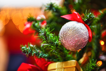 Christmas ball silver color hanging on the Christmas tree. Christmas. Horizontal photo