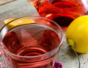 Fruit berry tea in the cup served on table