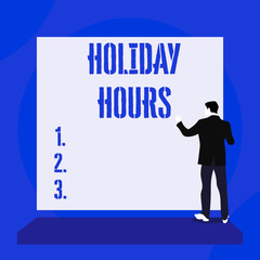 Text sign showing Holiday Hours. Business photo text employee receives twice their normal pay for all hours Back view young man dressed suit standing platform facing blank rectangle