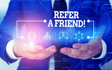 Conceptual hand writing showing Refer A Friend. Concept meaning direct someone to another or send him something like gift Male wear formal suit presenting presentation smart device