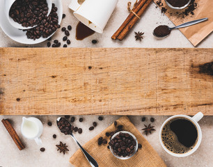 grunge wooden plank decorated with coffee and equipment, coffee background concept with copy space for text