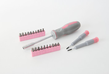 Screwdriver and a set of nozzles for screwdriver