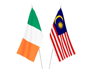 National fabric flags of Malaysia and Ireland isolated on white background. 3d rendering illustration.