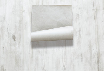paper on wooden background