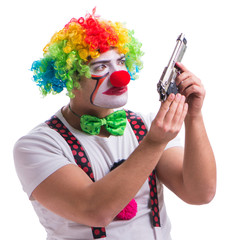 Funny clown with a gun pistol isolated on white background