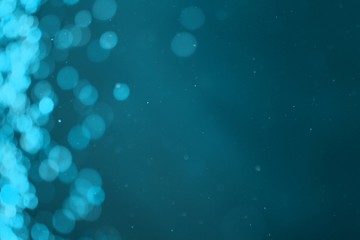 light blue glossy glitter one side frame bokeh texture - pretty abstract photo background
