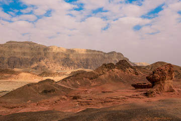 Fototapeta na wymiar Amazing View to the Red Rocks and Desert Sands in Timna National Park, Israel