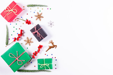 Christmas concept. Gifts and decorations on white background. Christmas, winter, new year concept. Flat lay, top view, copy space
