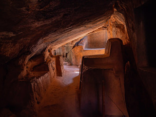 Inca ruins. Underground cave used for ancient Inca ceremonies at Archaeological Park of Qenqo...