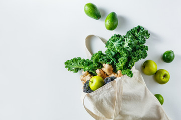 Cotton bag with green fruit and vegetables