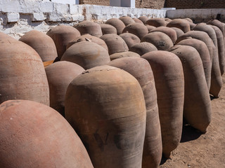 Fototapeta na wymiar Ceramic vessels used in the production wine and peruvian Pisco, Ica region, Peru