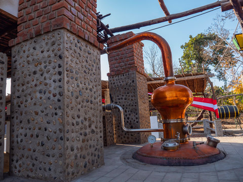 Alembic used in brewery to produce peruvian pisco and wine, a vineyard near Pisco, Peru