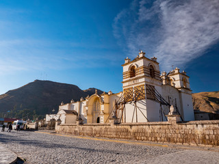 Reconstruction of a white church built by the Spanish conquerors. Village of Yanque, Colca Valley, Peru