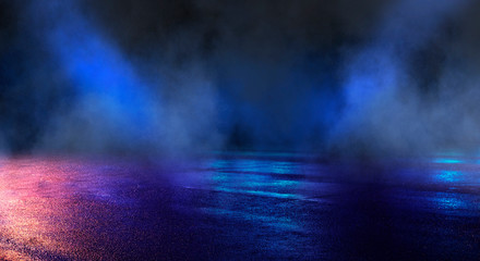 Wet asphalt, reflection of neon lights, a searchlight, smoke. Abstract light in a dark empty street with smoke, smog. Dark background scene of empty street, night view, night city.