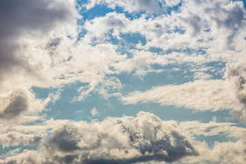 Gray storm clouds in the blue sky