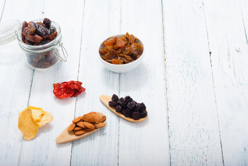 dried fruits on white wooden table