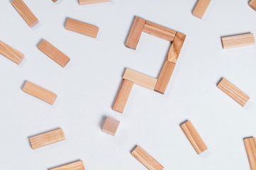 wood question mark on white background