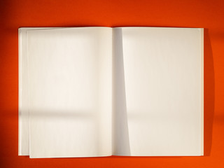 Close-up blank papers on red background
