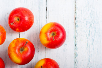 apple fruits on old white wooden table