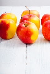 apple fruits on old white wooden table